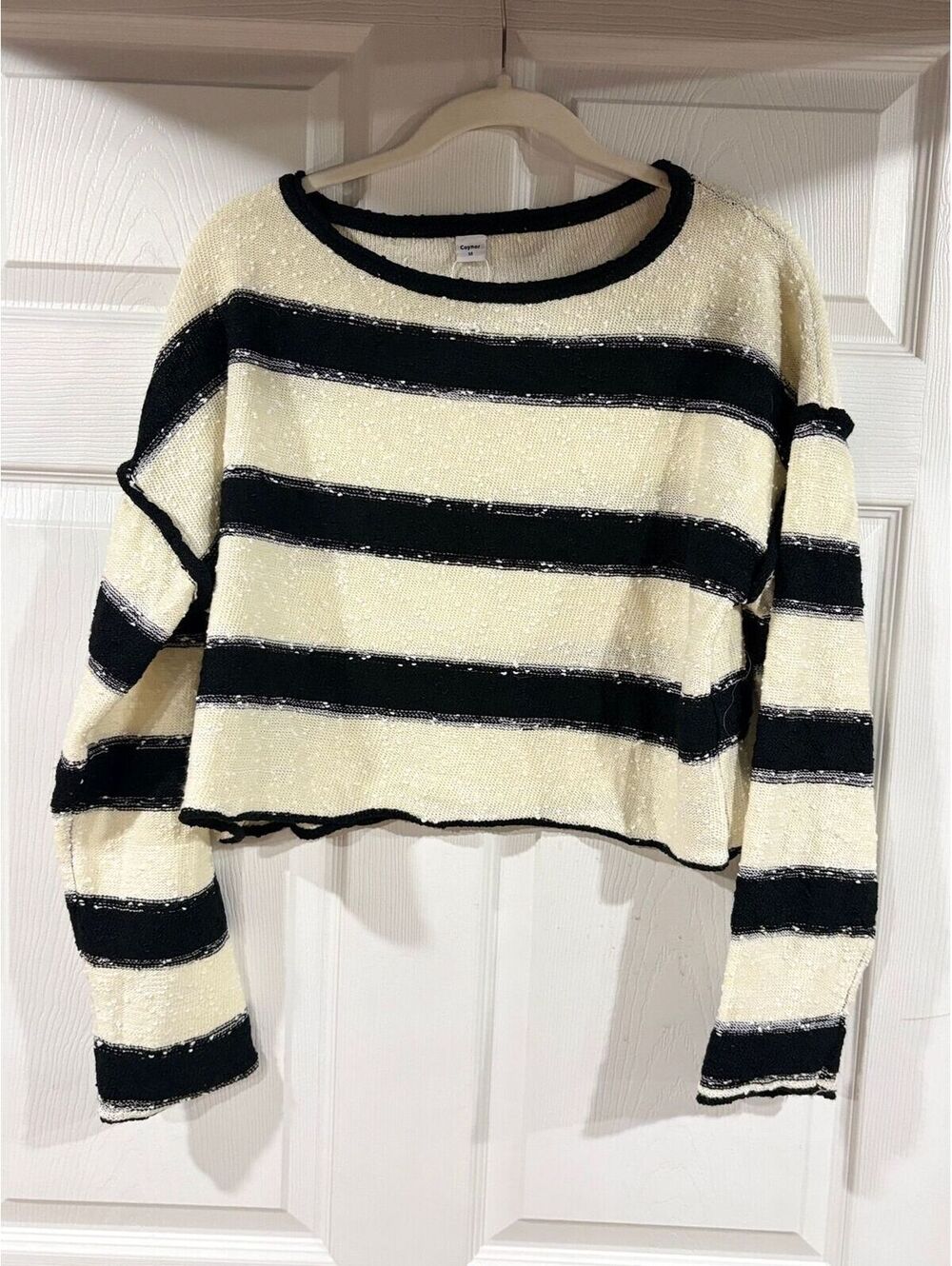 #268 NEW Black and White Sweater. Medium